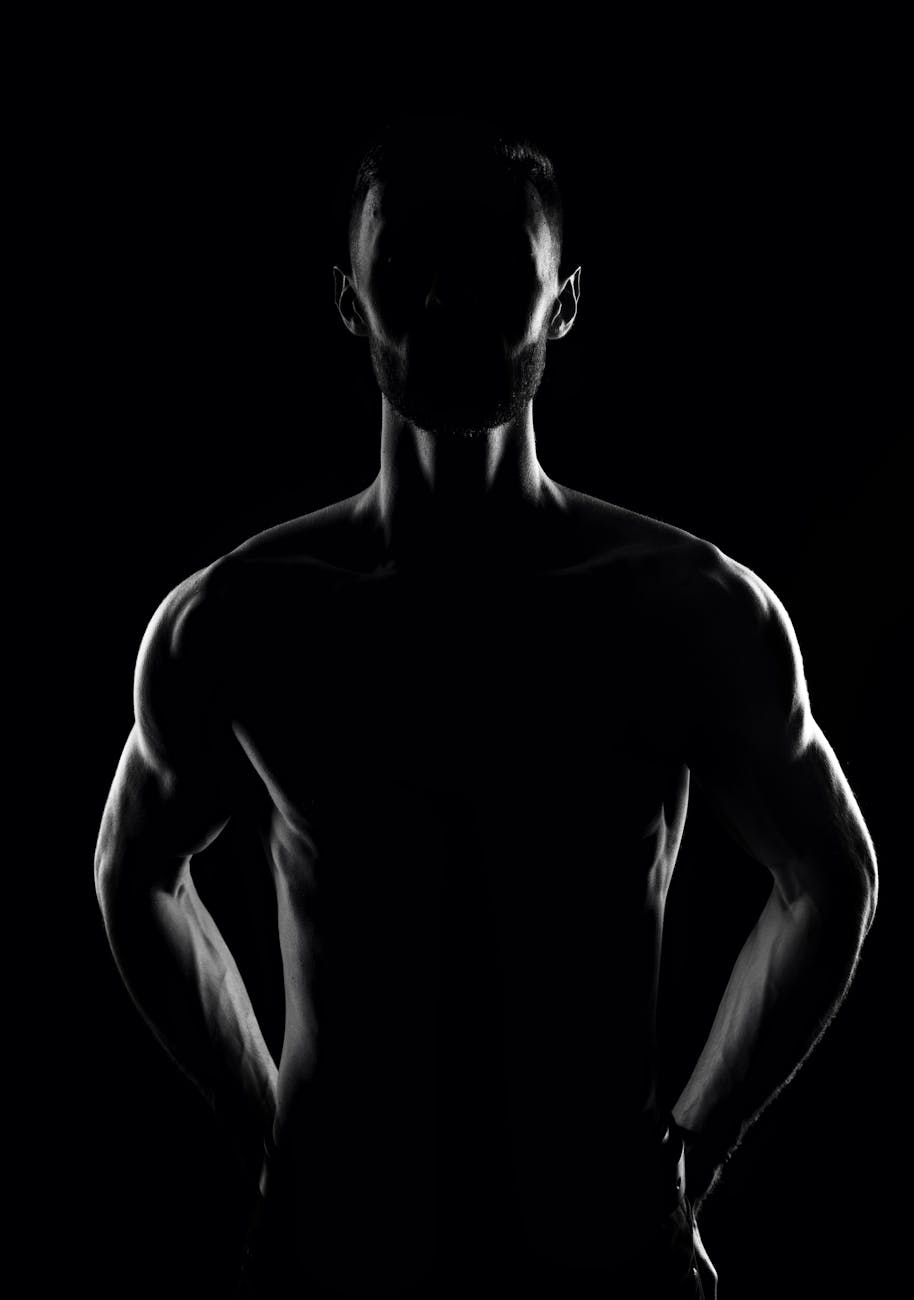 black and white photo of a shirtless man